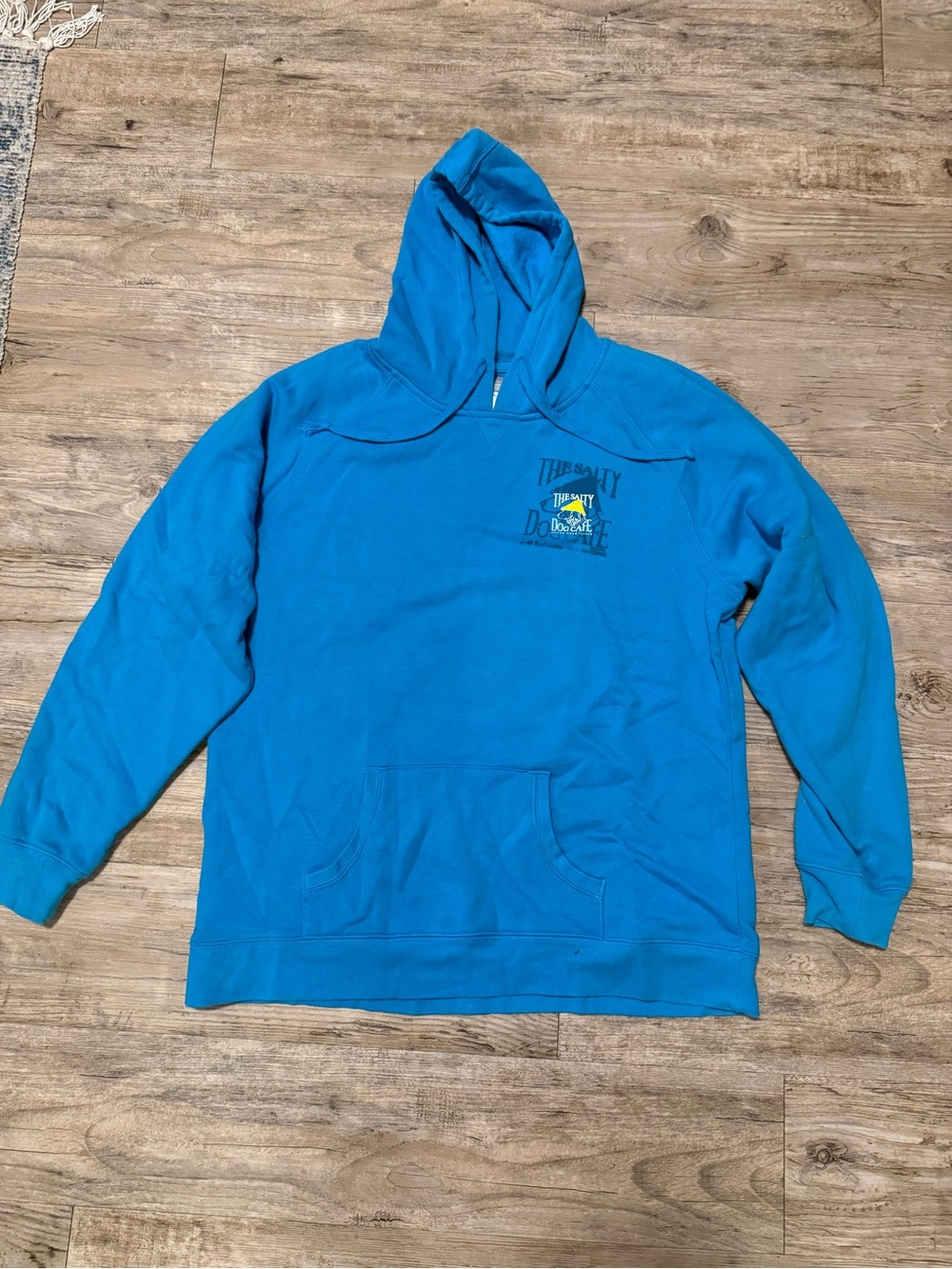 Bright Blue Pullover Hoodie with Small Chest Graphic